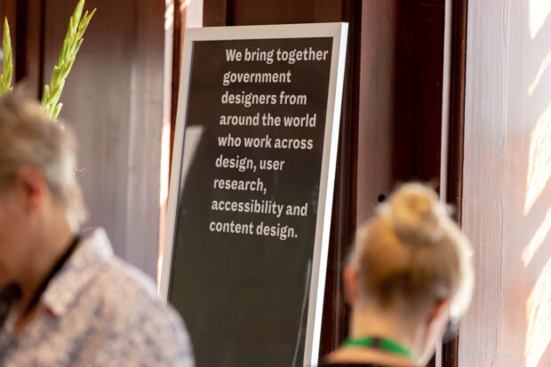 A poster at last year's International Design in Government Conference, which says: "We bring together government designers from around the world who work across design, user research, accessibility and content design."