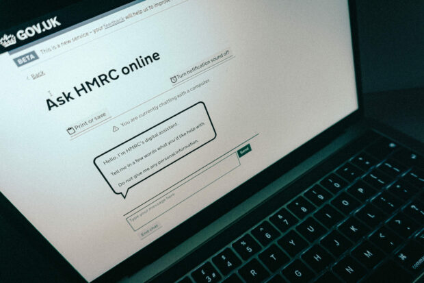 laptop showing HMRC chatbot